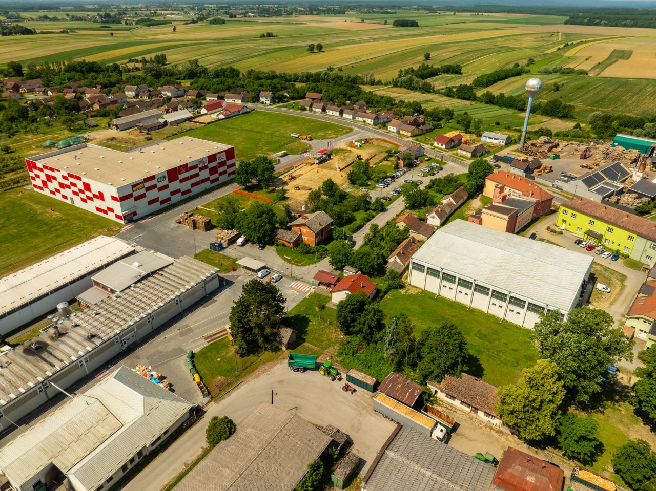 The Art of Drawing Readers In: Your attractive post title goes here Aerial photograph of an industrial area in Hercegovac, Croatia, with rural surroundings.